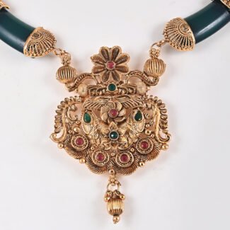 Temple Jewellery Necklace Set in Antique Gold with Green Accents by Khallaq