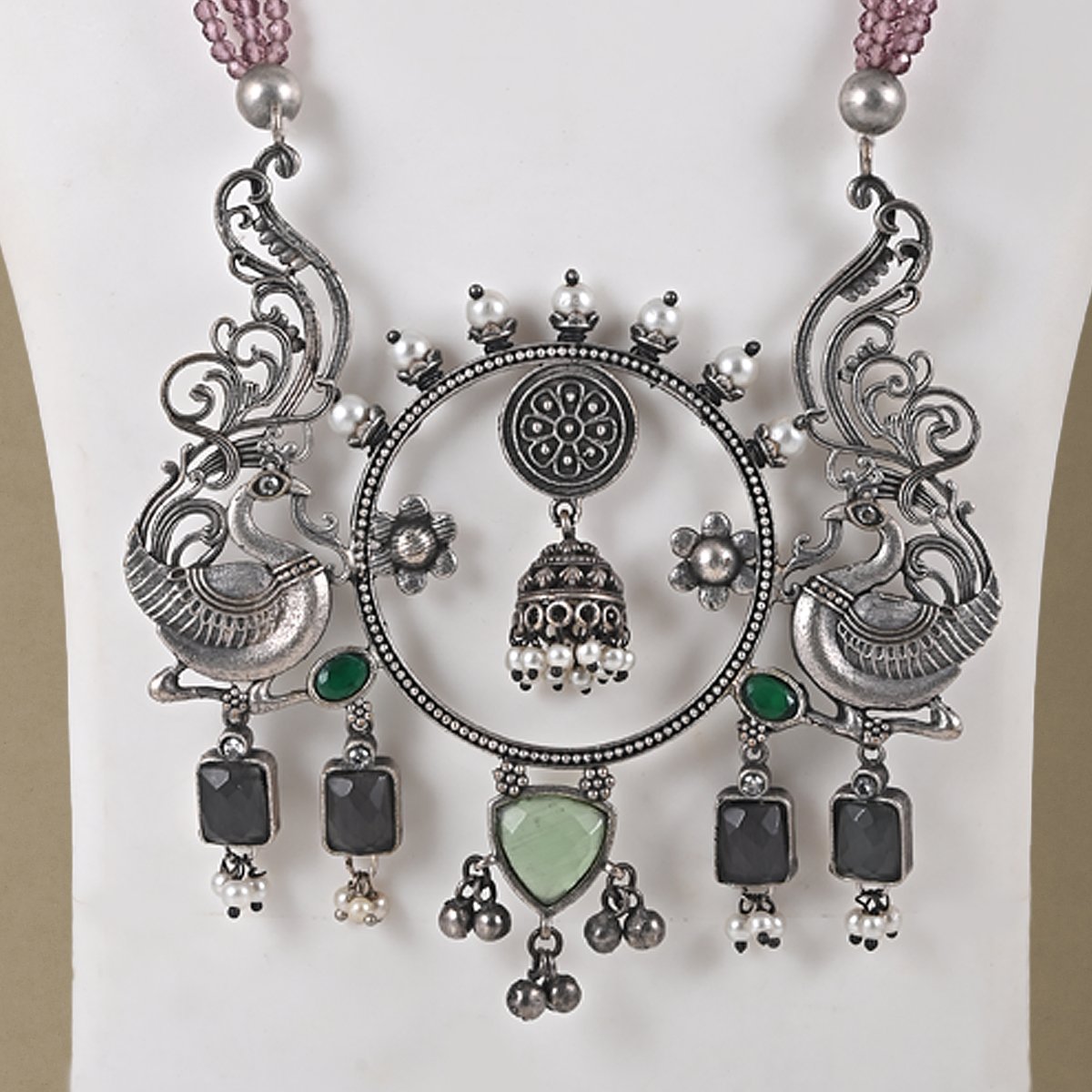 32a Handcrafted Silver Replica Statement Necklace with pink bead strands and oxidised silver peacock pendant from Khallaq Chand Collection.