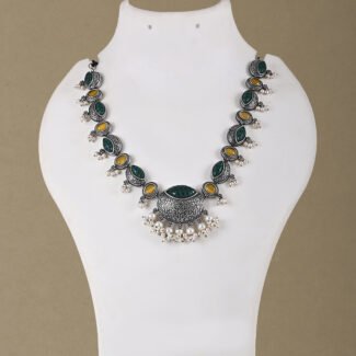 silver replica necklace set with green and mustard stones and pearl detailing by Khallaq