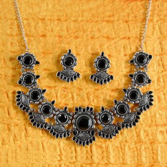 Silver replica necklace set featuring black faceted stones with matching earrings from Khallaq Chand Collection.