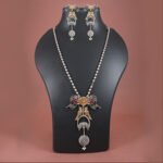Dual-tone silver replica necklace set with bird motif and multicolour stones from Khallaq Chand Collection