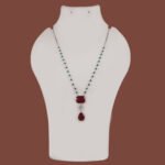 Silver replica chain pendant available in maroon, blue & light green, and purple stone variants from Khallaq Chand Collection.